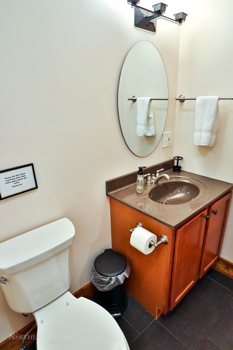 Second-level full bathroom with shower.