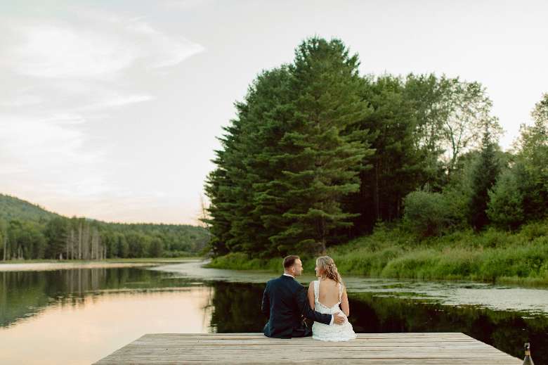 groom and bride on dock