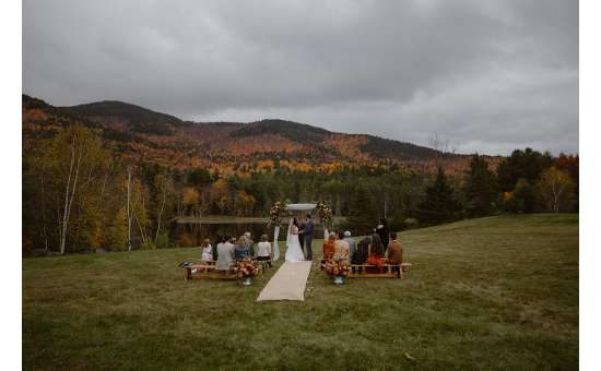 Fall wedding on private property in the Adirondacks - Photo by Avonture Elopements