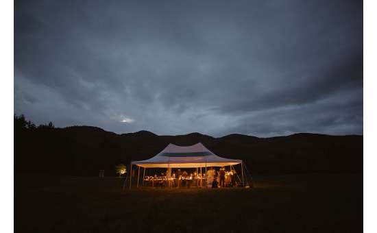 Tented wedding on private property in Adirondacks - Photo by Avonture Elopements