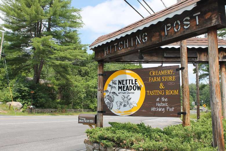 sign for the hitching post and nettle meadow