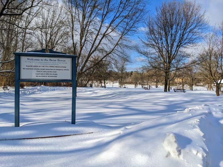 sign by park in winter