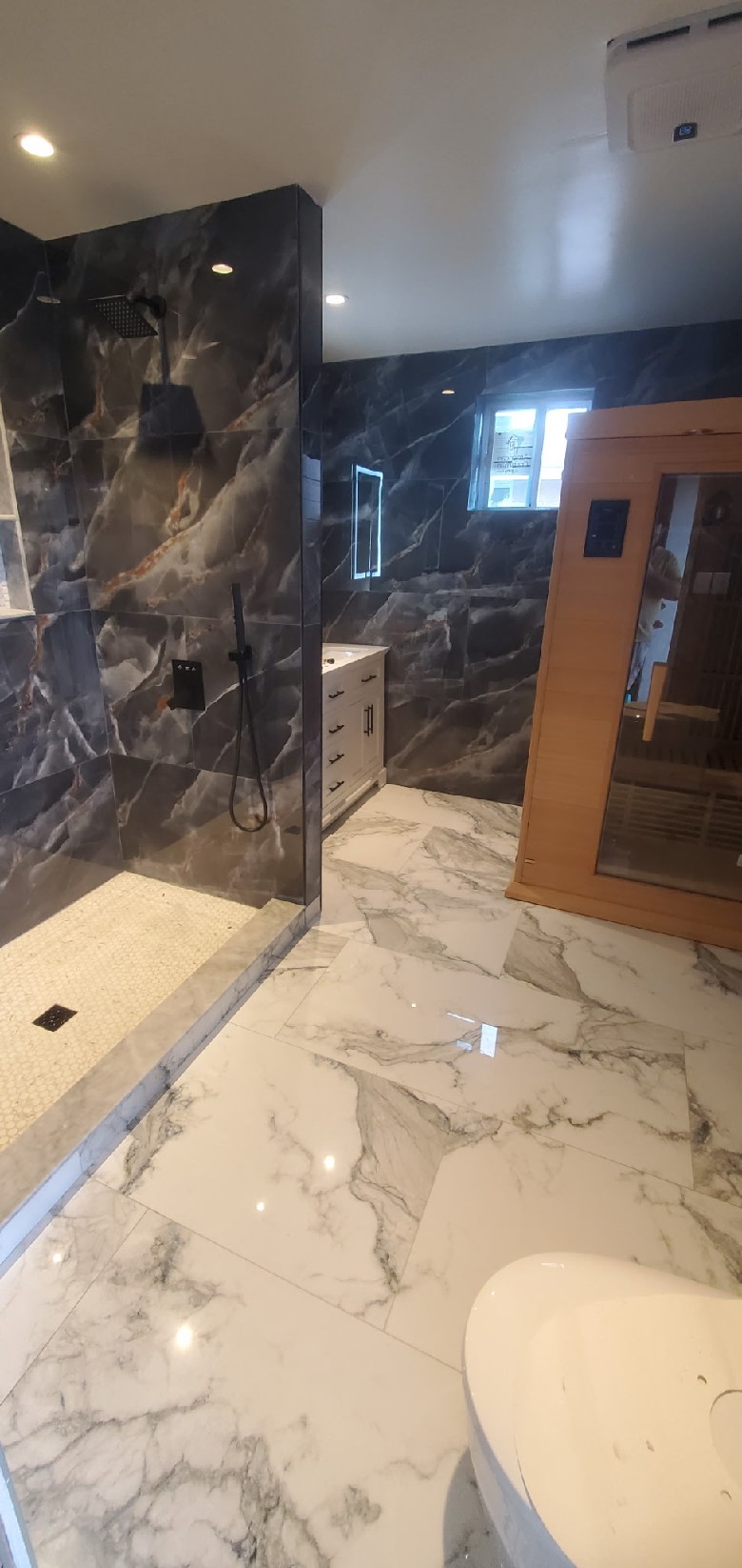 Fully renovated bathroom with all new sauna, bidet, shower large rain forest style and hand held, double vanity, medicine cabinet, vent, smart lighting,