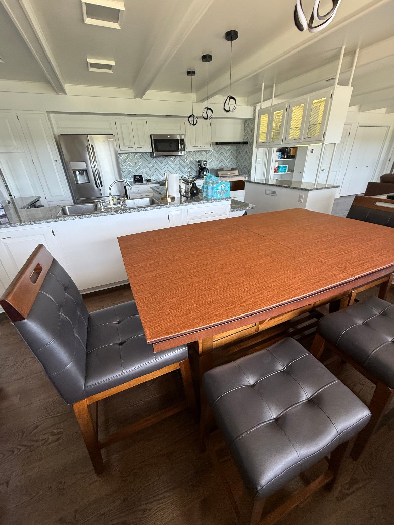 Kitchen nook area with new table and 8 stools