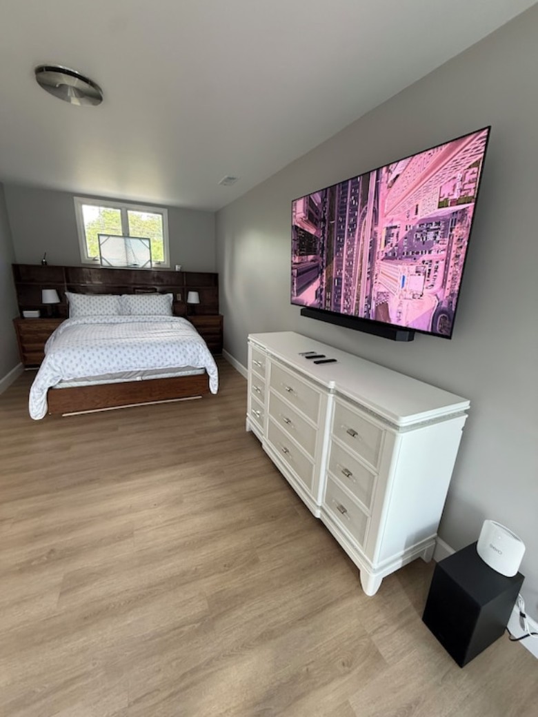 Bedroom 5 of 5 - Master bedroom suite with new furniture, new Smart Apple 55 inch TV, sound bar, sub woofer audio system. Walk in closets. Walk in private full bathroom. Door leading out to balcony