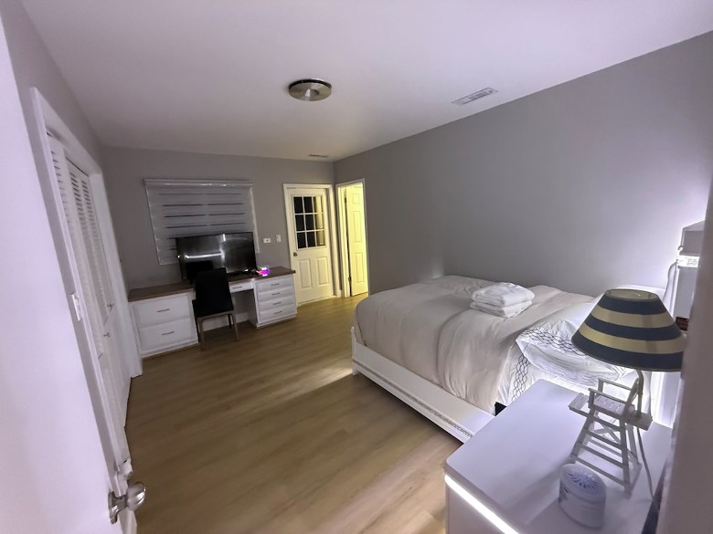 Bedroom 3 of 5 - new furniture, new TV, walk in closet, direct access to outdoor balcony