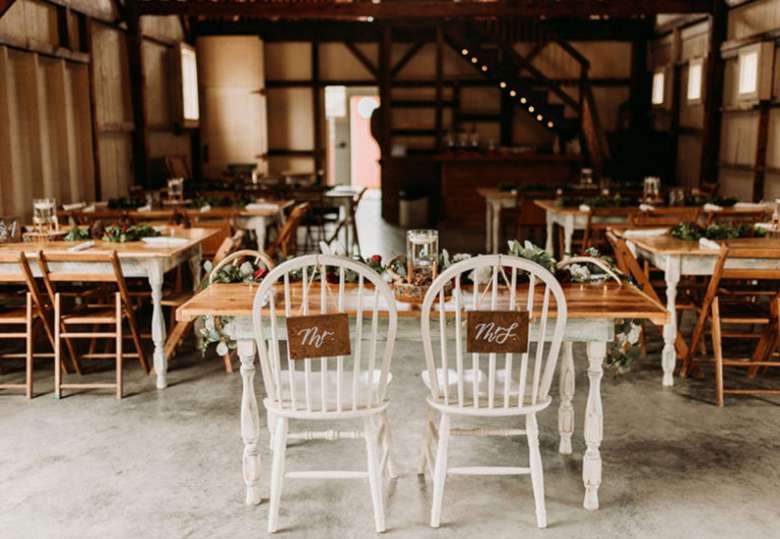 rustic barn set up for a wedding reception