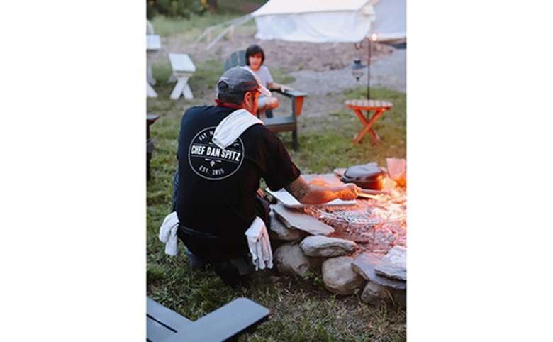 Try a catered campfire dinner by Chef Dan Spitz.