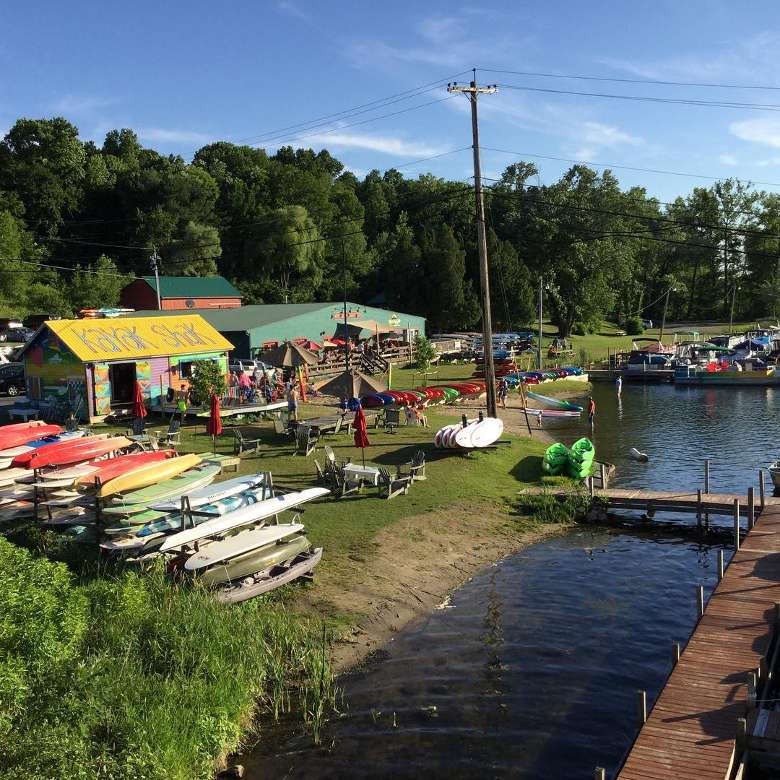 view of a paddlesports shop and boat docks