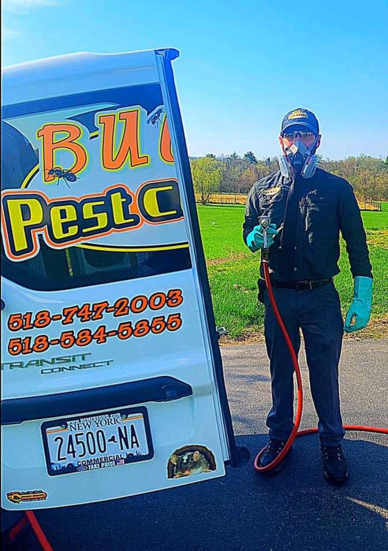 pest control man by vehicle
