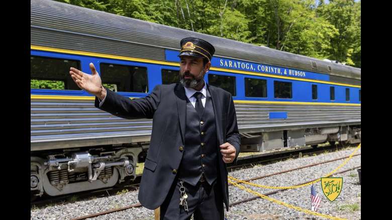 Train Conductor greets guests