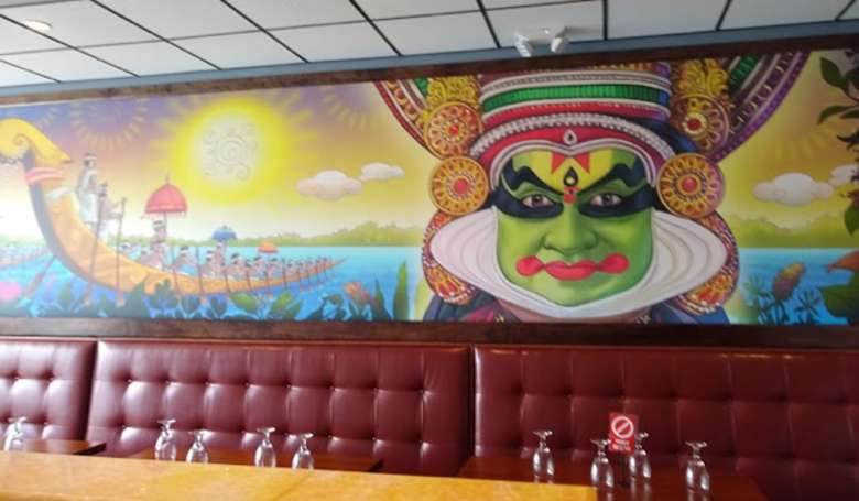 painting on a wall in a restaurant