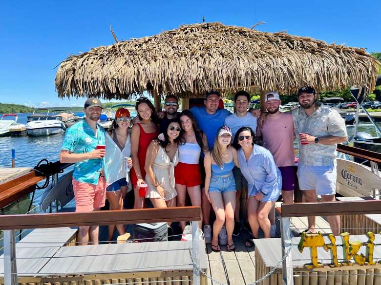 group of people on a tiki boat