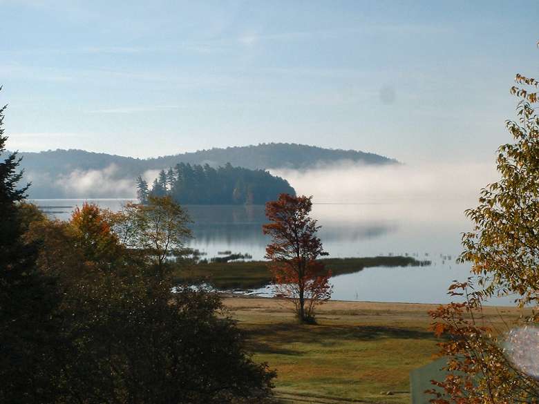 scenery with lake and fog