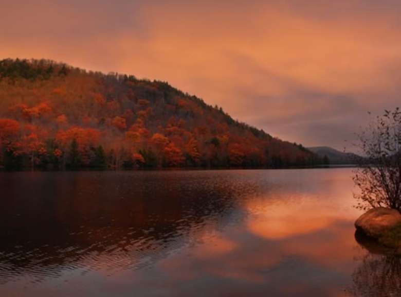sunset shining on a lake