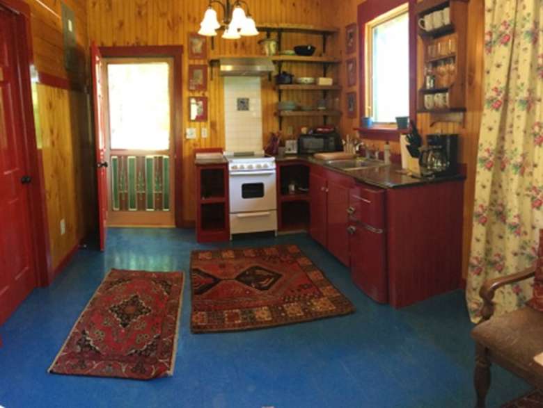 a kitchenette in a cabin