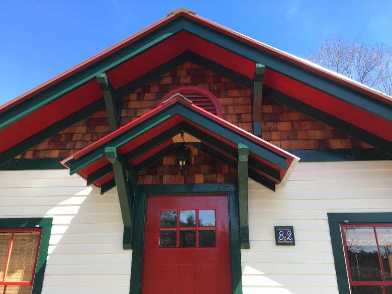 front of a cottage and the door