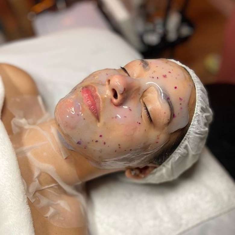 woman with a facial treatment