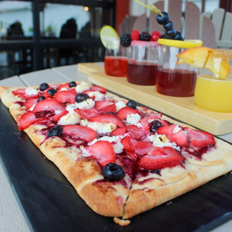 Pair a flatbread pizza with one of their flights for a mouthwatering meal.