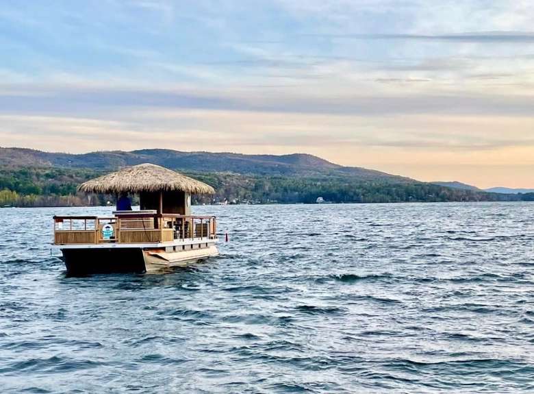 tiki tour boat on water