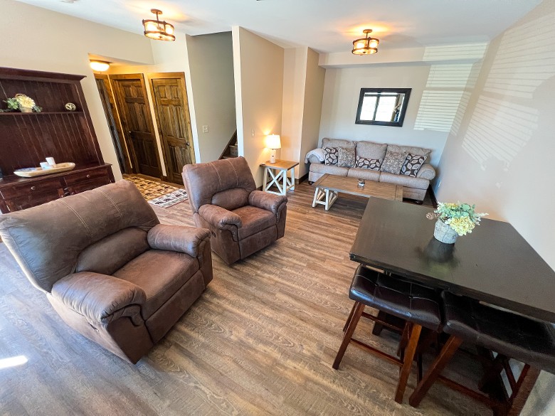 The lake level features a living space with a sleeper sofa