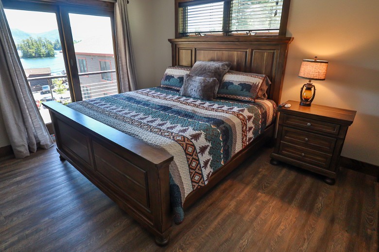 King bedroom with sliding glass doors and a small deck perfect for sipping morning coffee