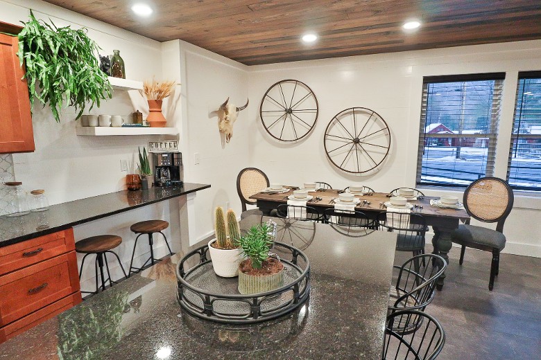 Kitchen and dining room with seating room.