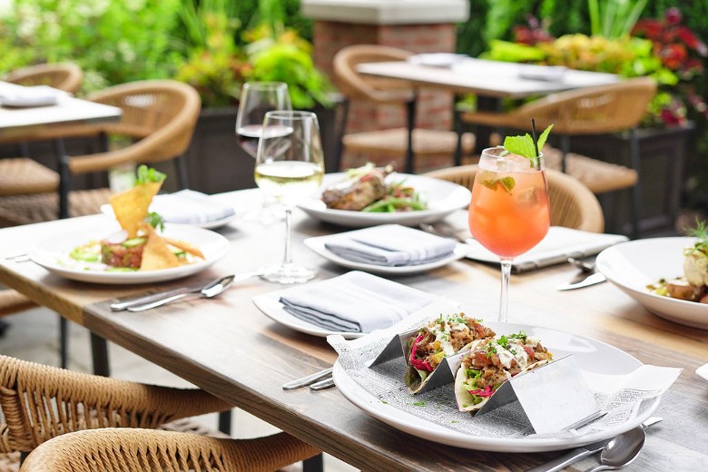 food and drinks on patio restaurant tables