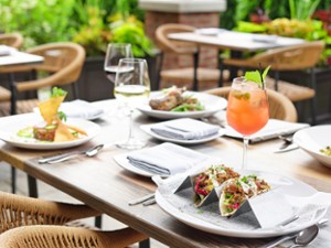 food and drinks on patio restaurant tables