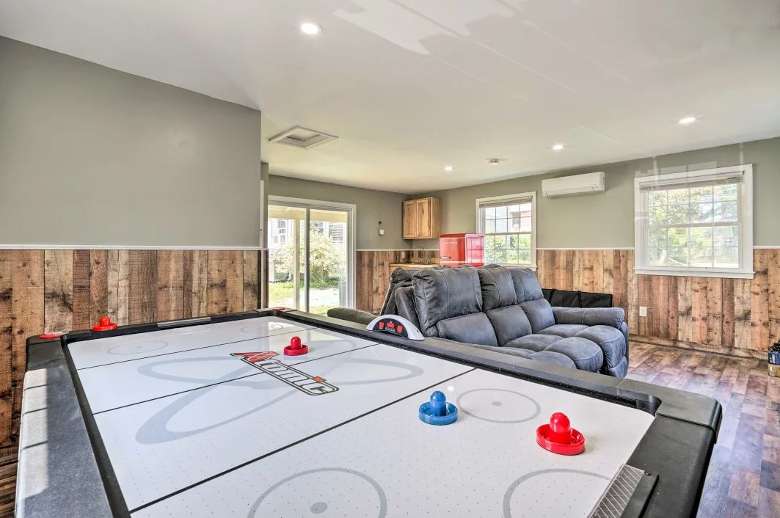a house game room with air hockey table