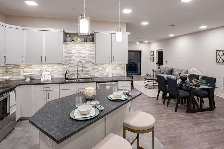 a spacious and luxury kitchen and dining room