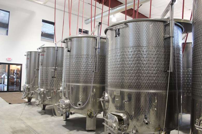 large steel winery tanks