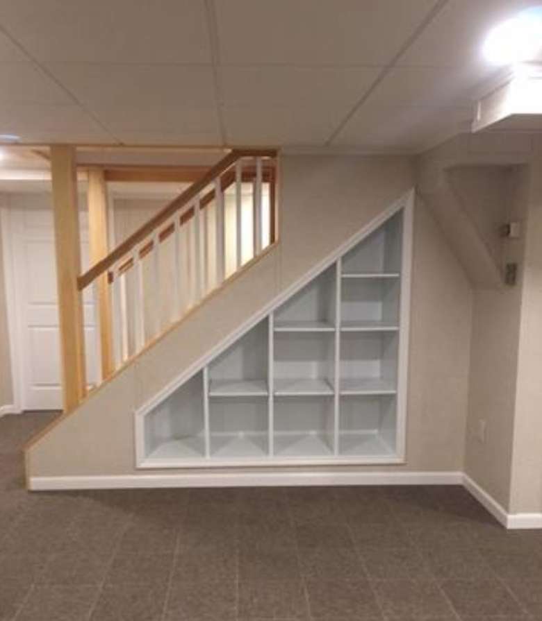 basement stairs and built in shelving