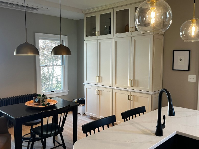 dining area, lighting, restored cast radiators, solid maple flooring, etc.