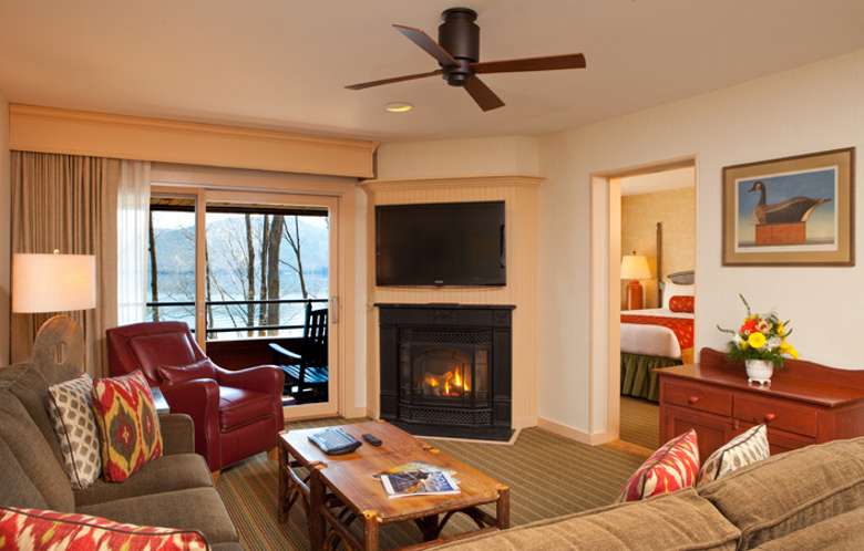 a lodge suite with a fireplace in the living room area