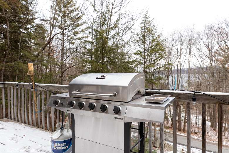 deck with a steel grill on it in winter