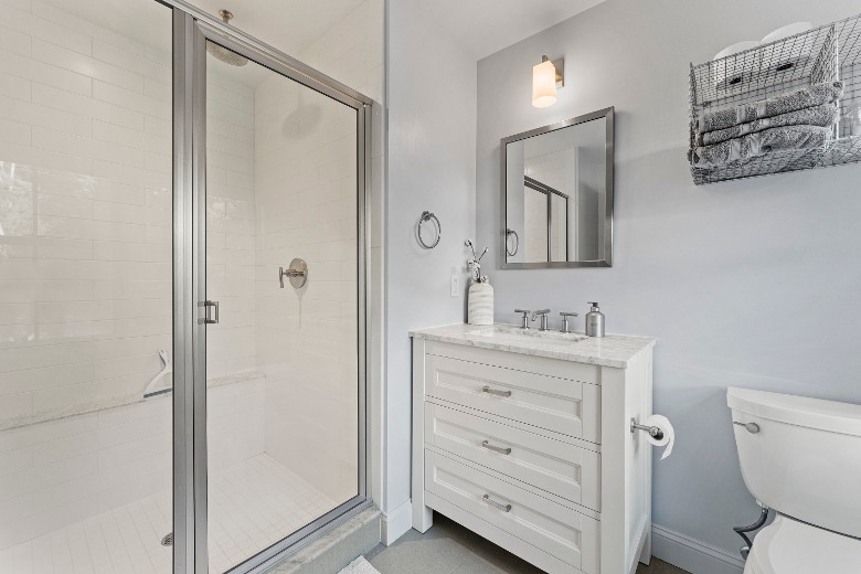 Second level bathroom attached to queen bedroom