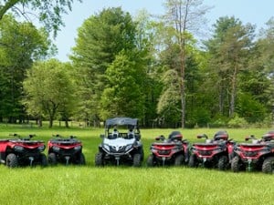 Venture in the woods on an ATV!