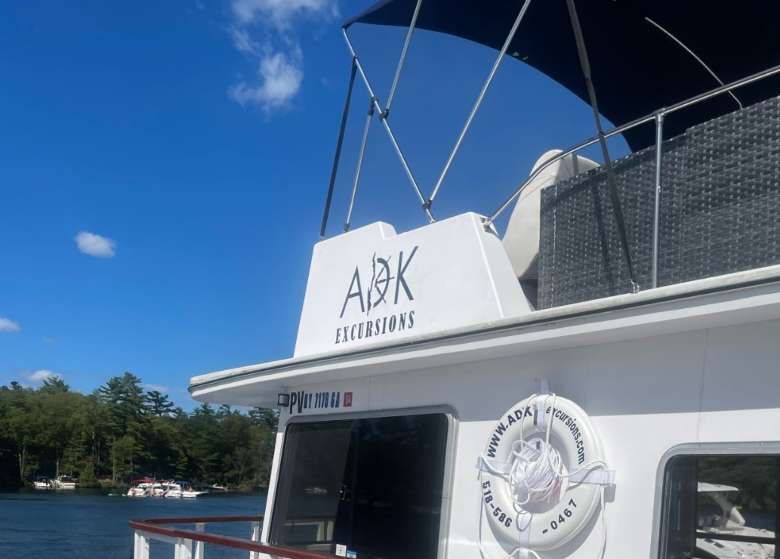 ADK Excursions logo on boat