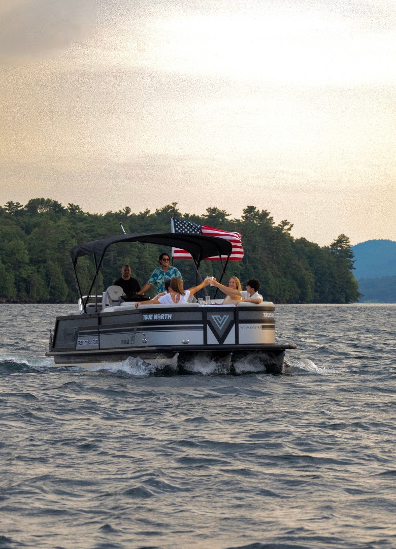 a boat traveling on a lake
