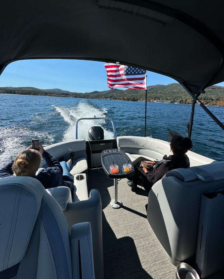 people relaxing on a boat