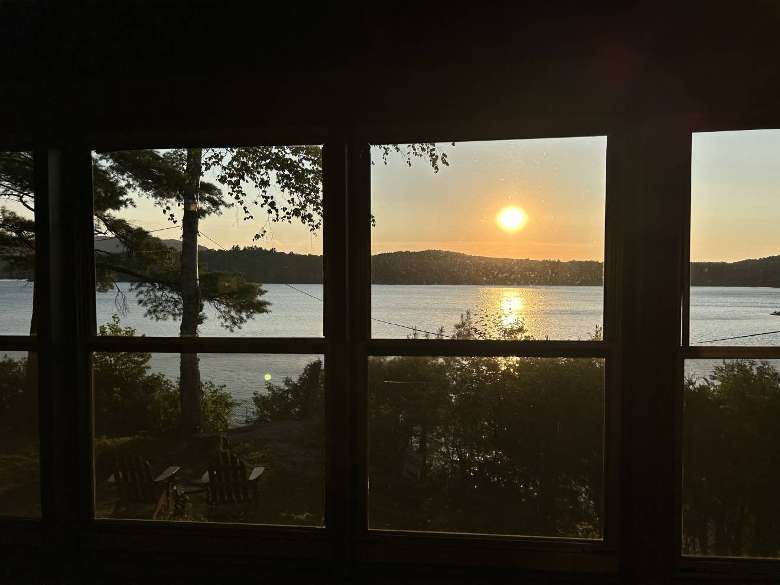 a sunrise or sunset over a lake