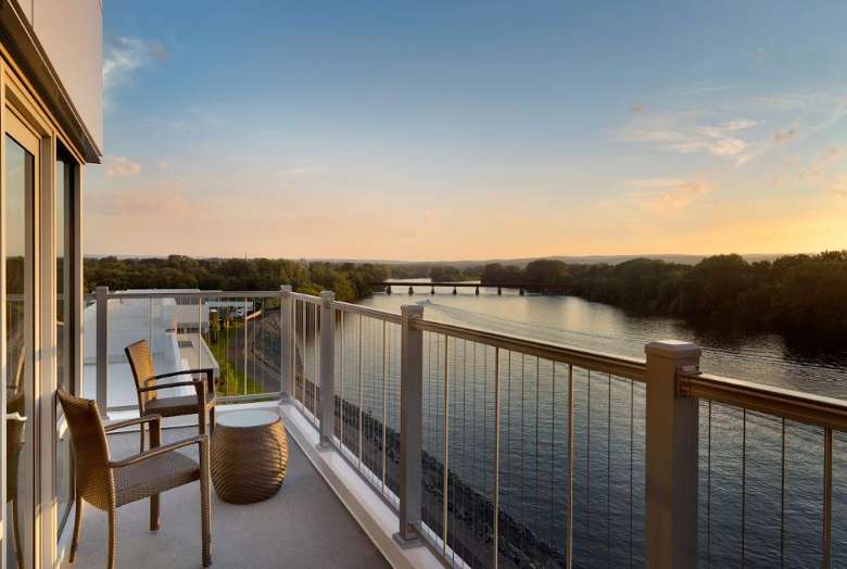 hotel balcony room overlooking a river