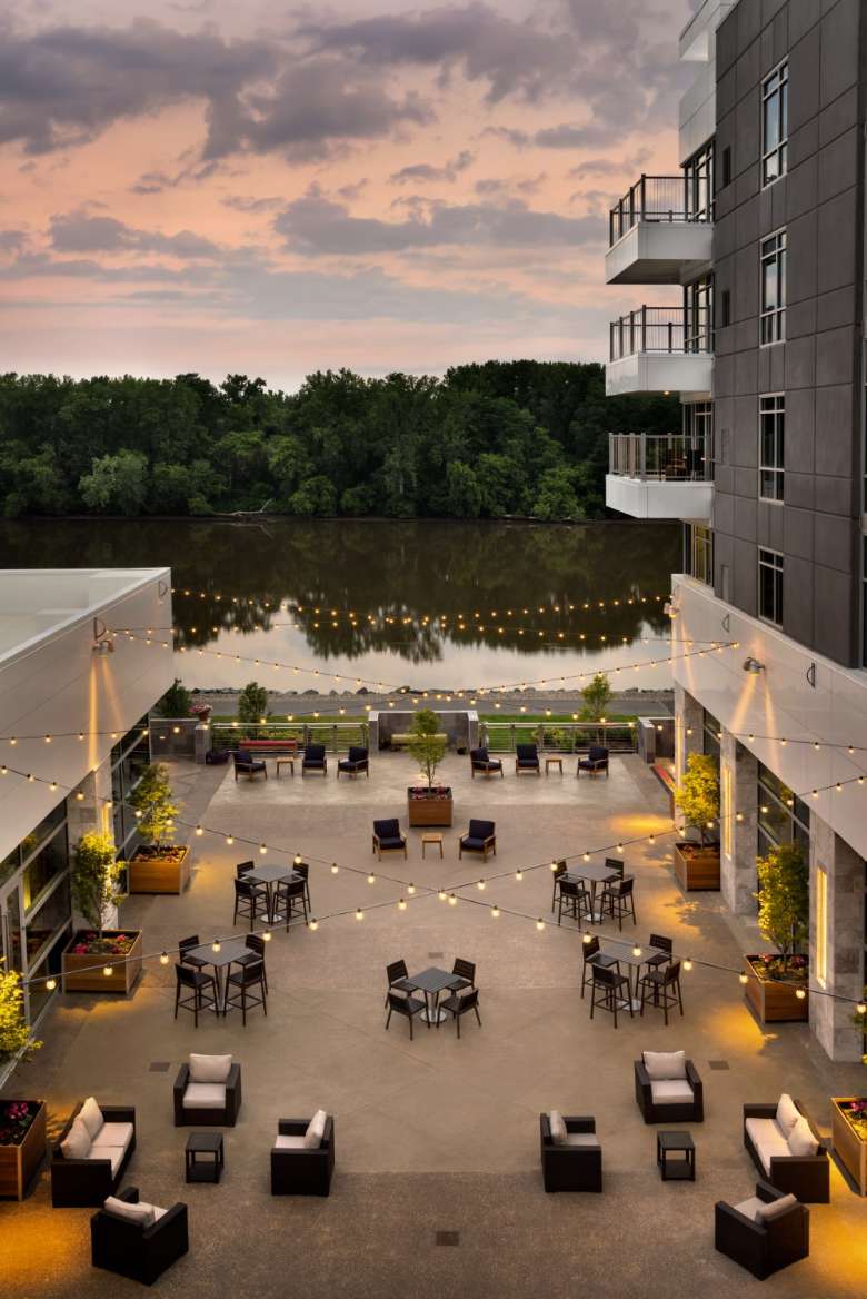 aerial view of outdoor seating by a hotel