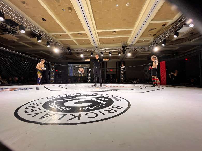 two mma fighters in a ring