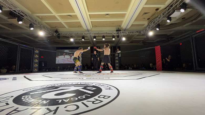 two mma fighters in a ring