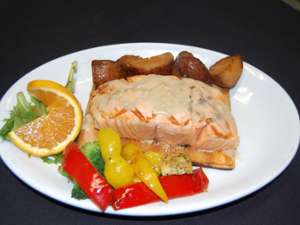plate of salmon with potatoes and veggies