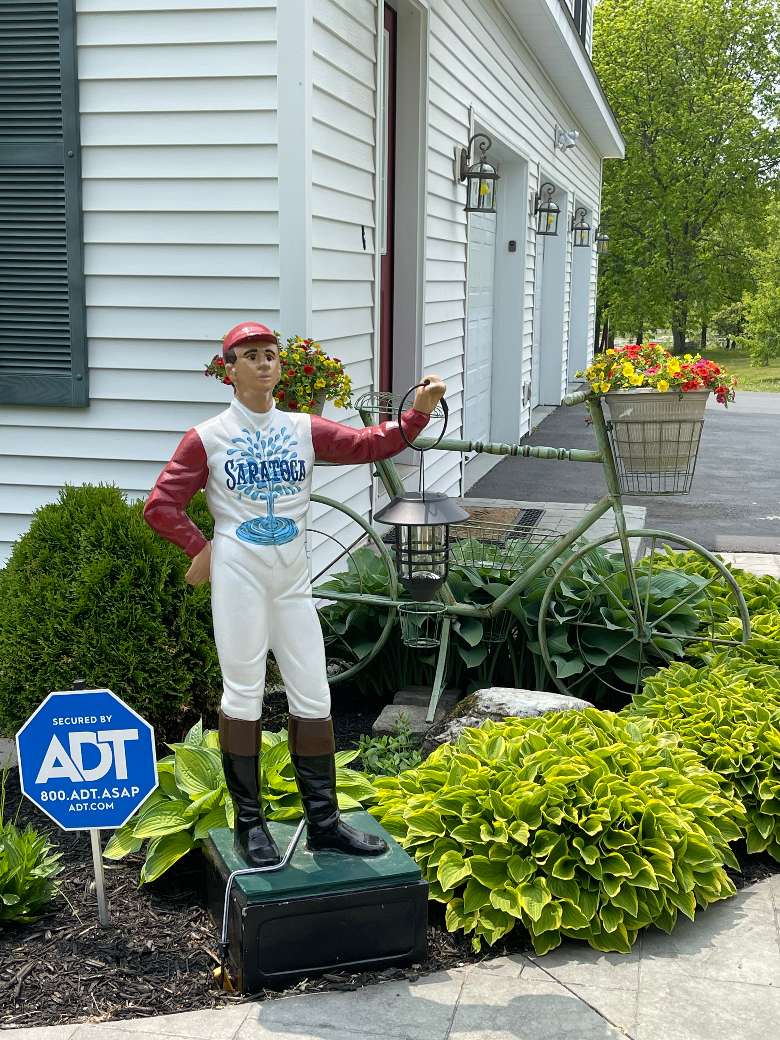 jockey sculpture on exterior of house