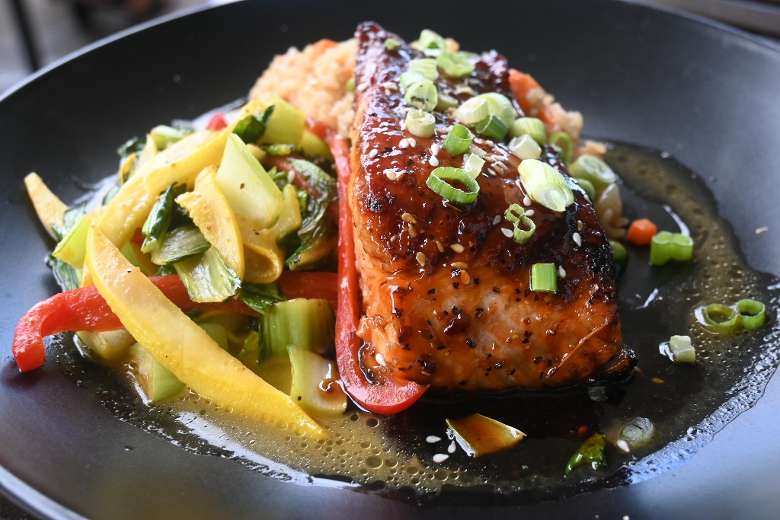 Salmon dish with vegetables.