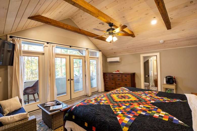 Master bedroom with screened in porch